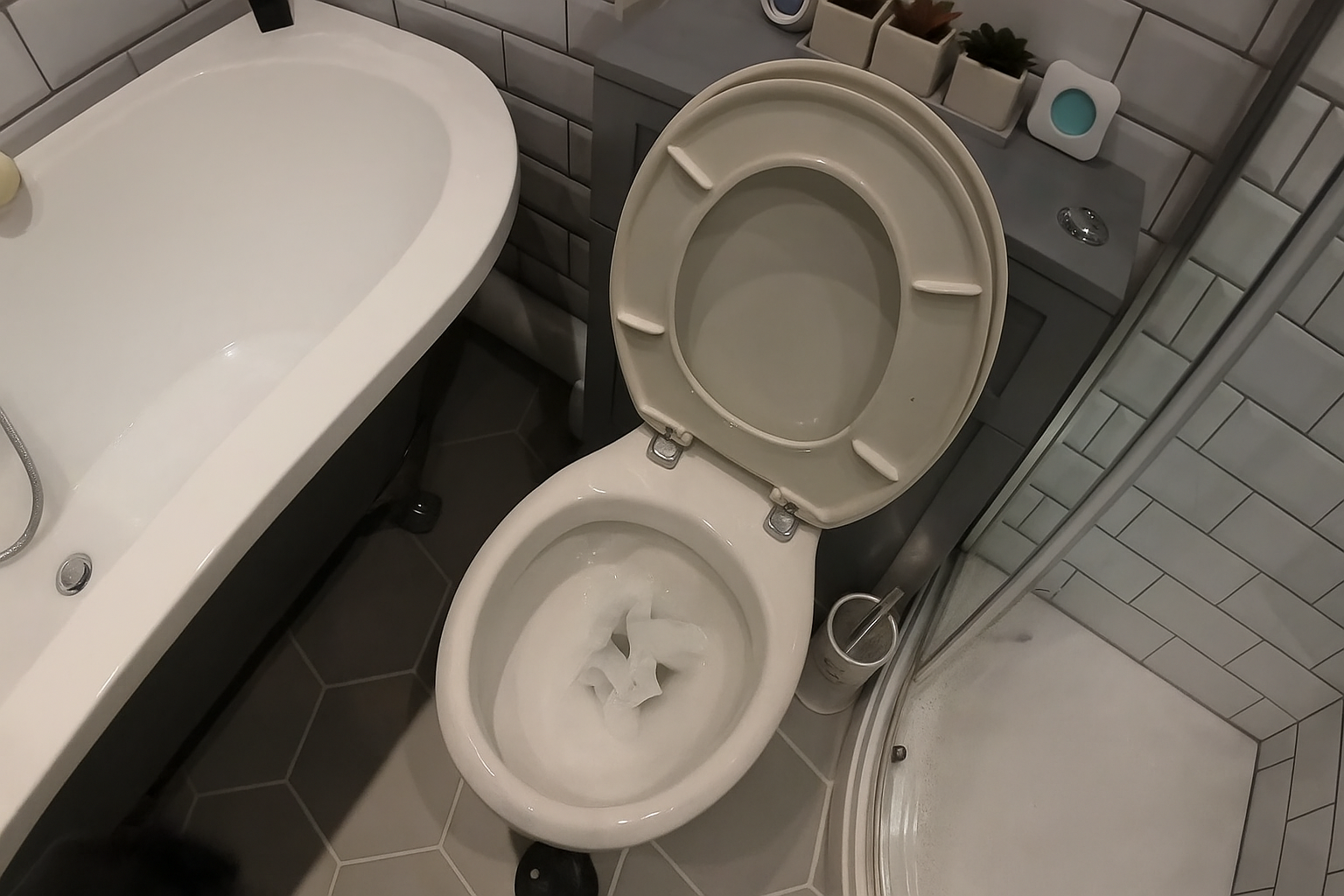 Initial Problem — Overflowing Toilet & Suspected Wipes